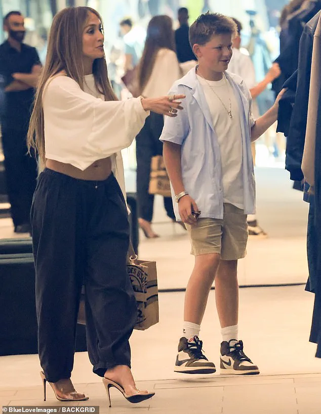 Jennifer Lopez's Midriff Exposure Sparks Debate Over Public Figures' Sartorial Choices Around Minors