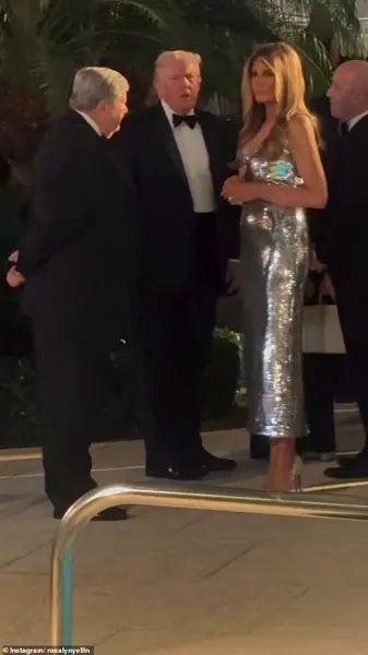 A Night of Opulence and Elegance: Melania Trump's Shimmering Silver Gown Steals the Spotlight at Mar-a-Lago's New Year's Eve Celebration