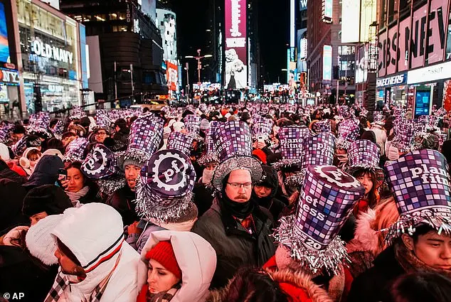 New Year's Eve Celebration in Times Square Features Iconic Ball Drop and Confetti Display
