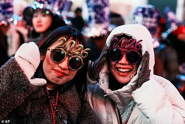 New Year's Eve Celebration in Times Square Features Iconic Ball Drop and Confetti Display
