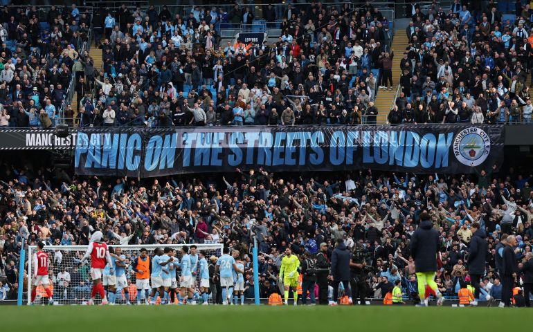 Arsenal's title hopes fade after chaotic draw with Manchester City